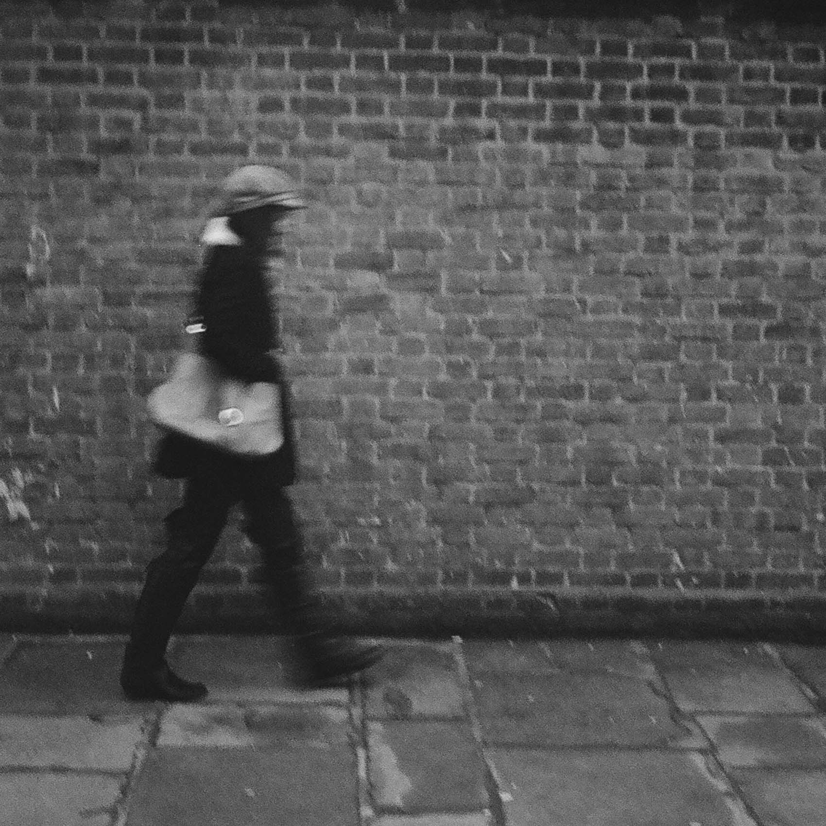 don't waste your film | girl walking by the brick wall
